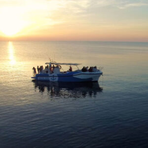 Bootsfahrt bei Sonnenuntergang von Fornells